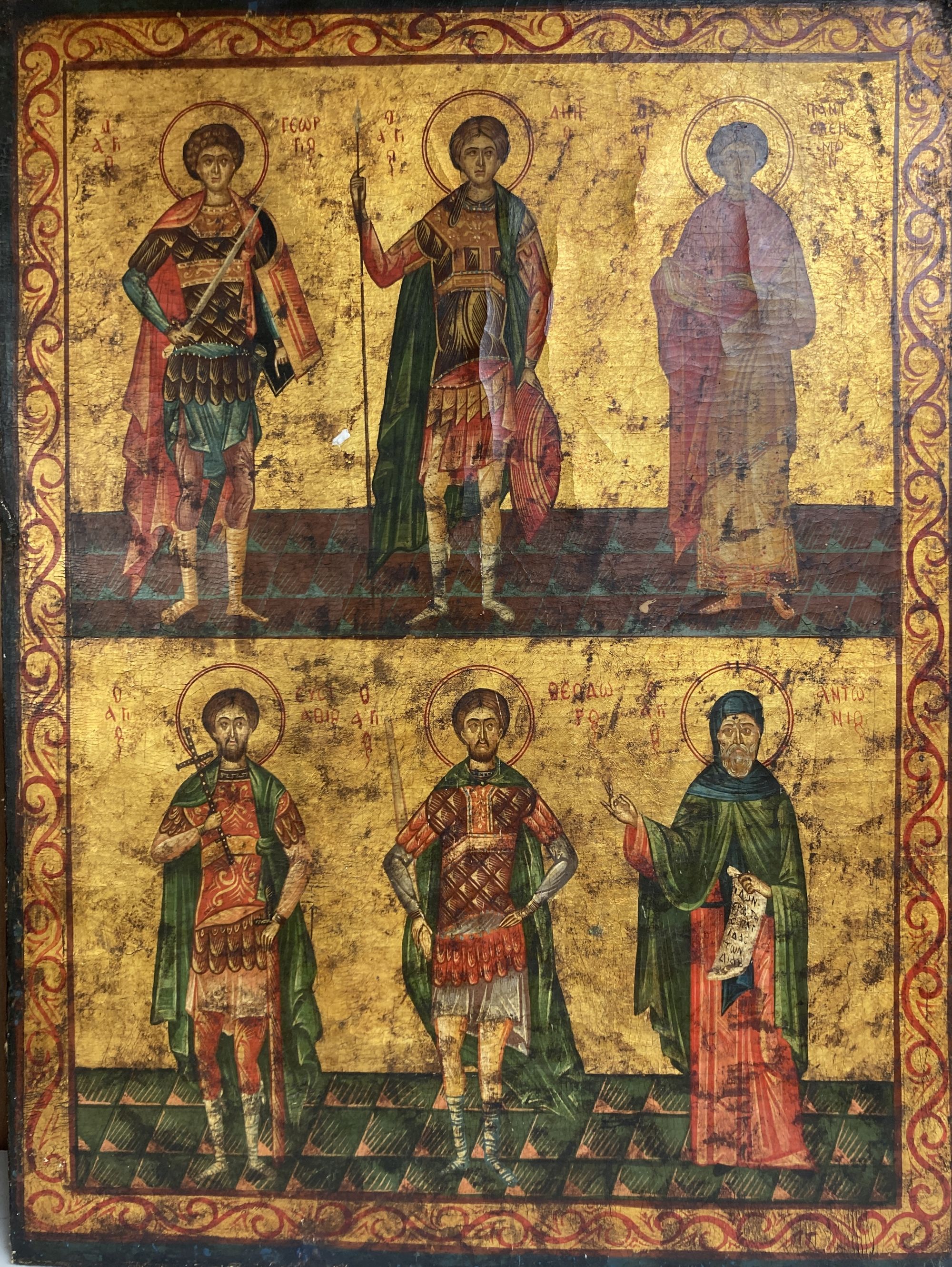 A late 19th century tempera on icon depicting six Saints, 47 x 35.5cm